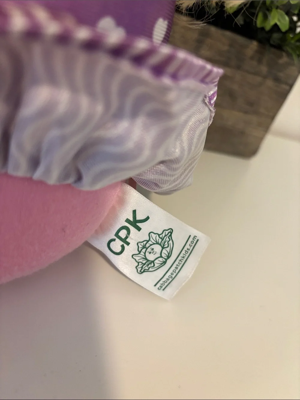 Cabbage Patch Kids Doll in Purple, Pink and white Dress